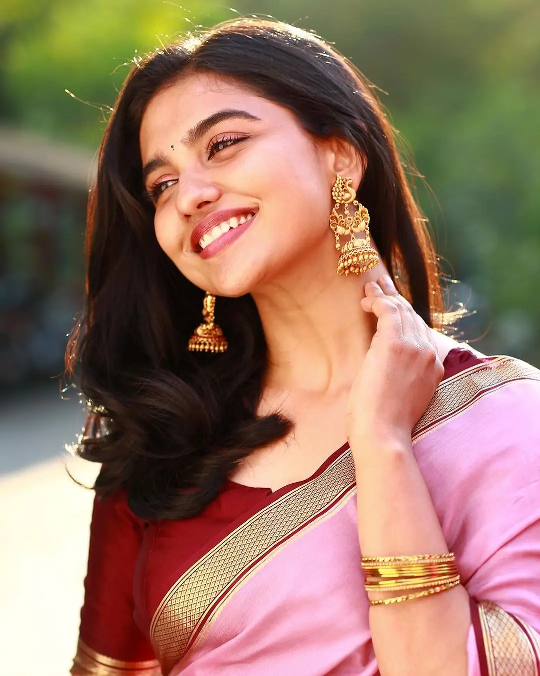 Malayalam Actress Mamitha Baiju in Pink Saree Maroon Blouse